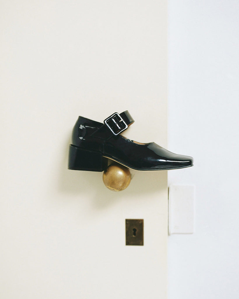 About Arianne Charlie in Black Patent